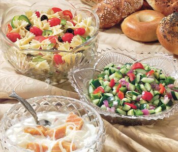 Pasta and Israeli salad bowls with pickled lox