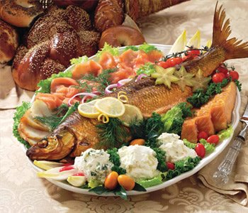 Smoked fish platter with whitefish and garnish