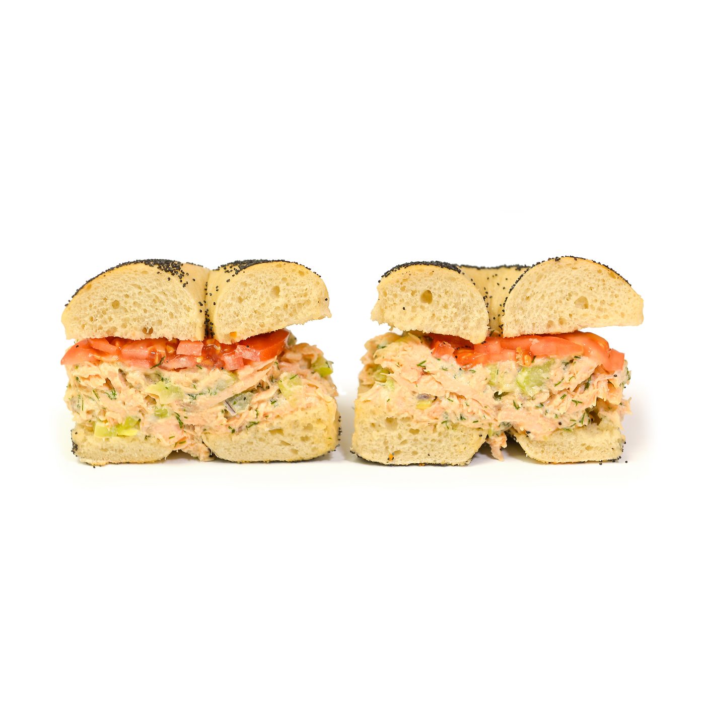Overstuffed tuna salad bagel sandwich