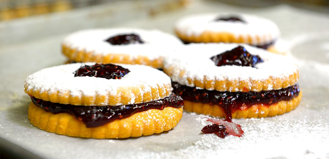 Linzer tarts dusted with powdered sugar