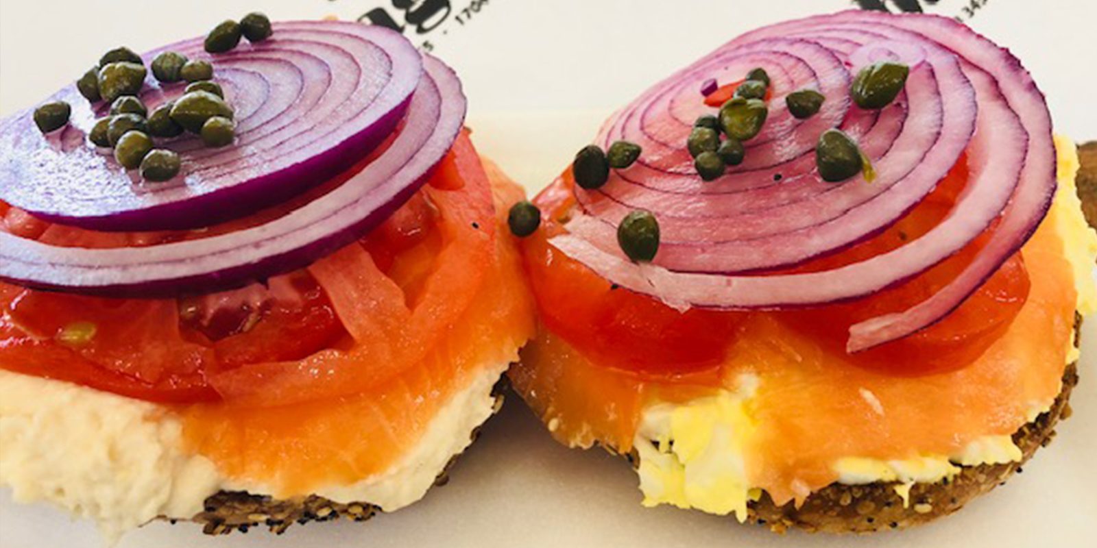 Nova lox bagels with tomato and red onion